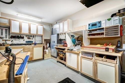 garage with many cabinets and shelves